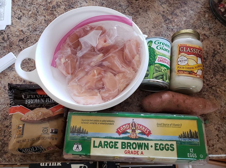 photo of ingredients: eggs, chicken, alfredo sauce, rice, beans, etc. 