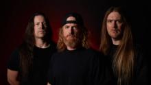 three white males as members of the dying fetus band