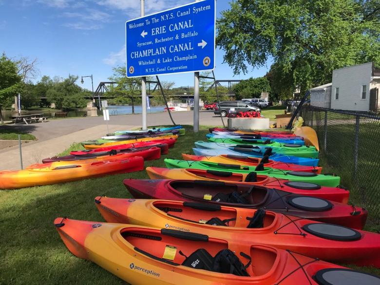 Colorful kayaks line the waterfront