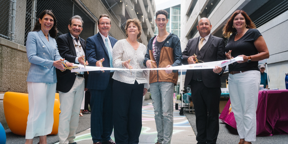 People at ribbon cutting for William Street in downtown Albany