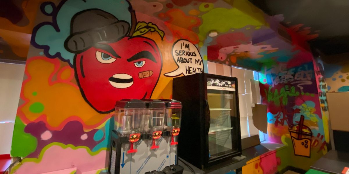 Interior of Healthy Soul including wall art and coolers