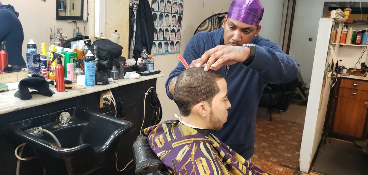 Man receives haircut