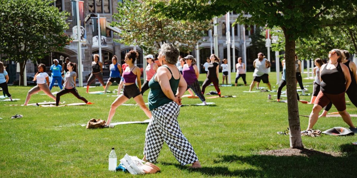 people doing yoga outside.