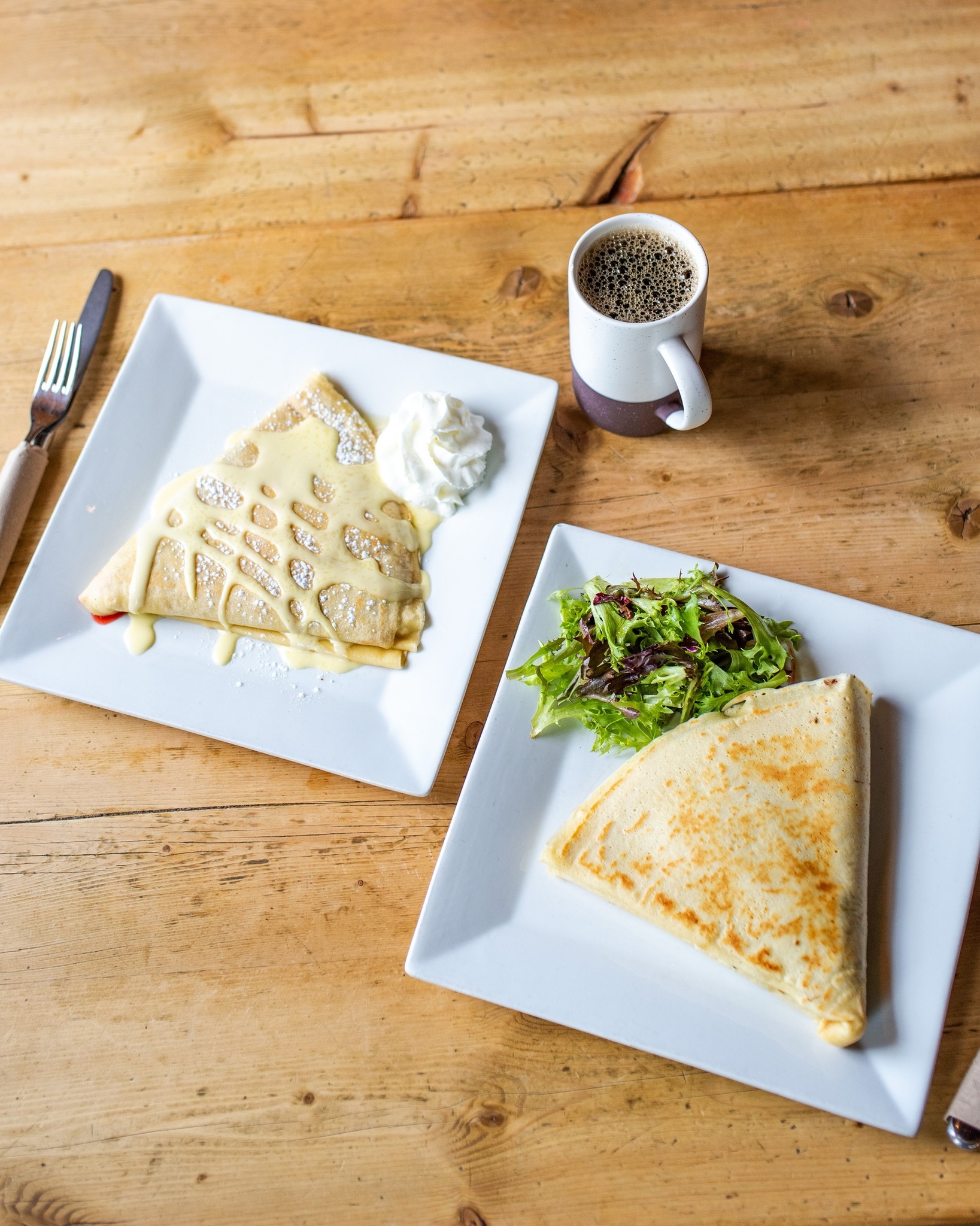 two crepes sitting on the table