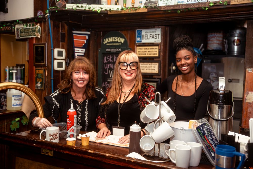 Tess, owner of McGeary's, and friends