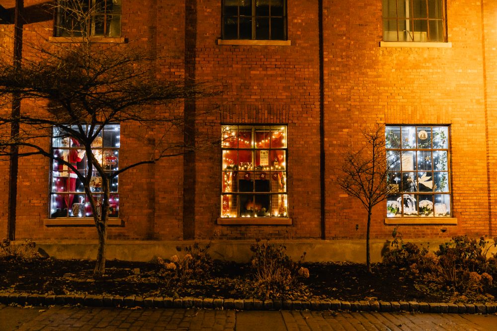 windows decorated with lights downtown