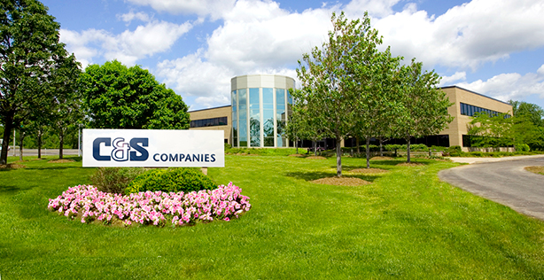 C&S Headquarters with sign and green lawn