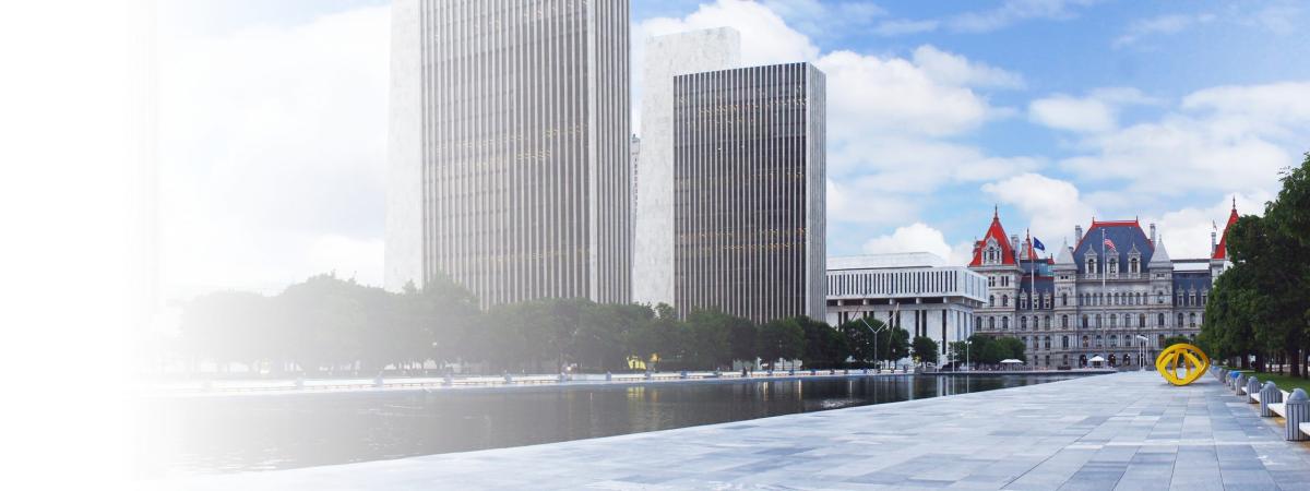 Empire State Plaza fading in with Capitol in background