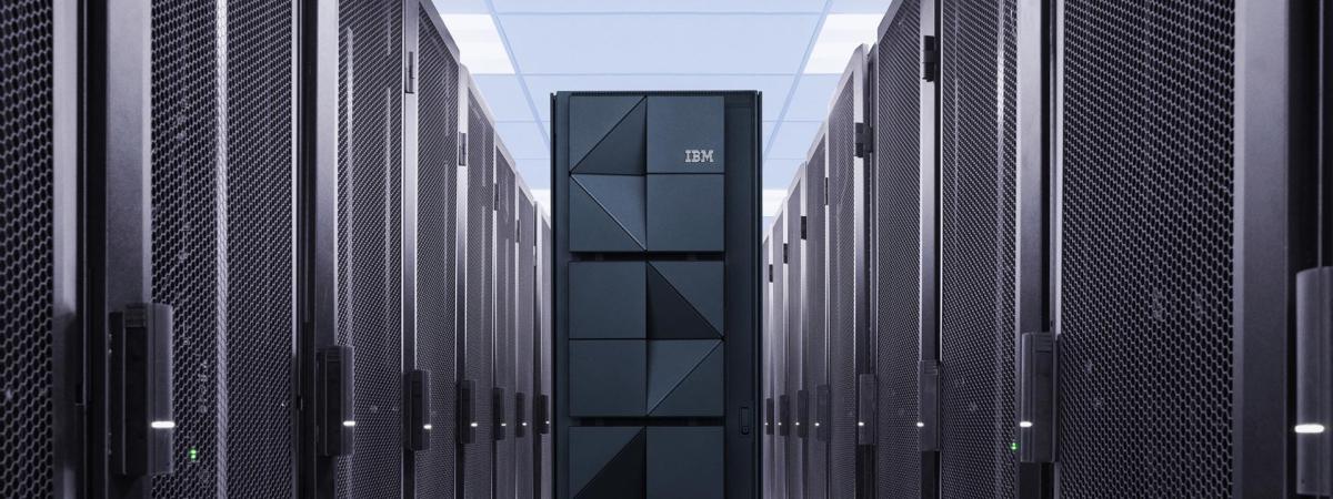Computer racks and tall computer with IBM logo