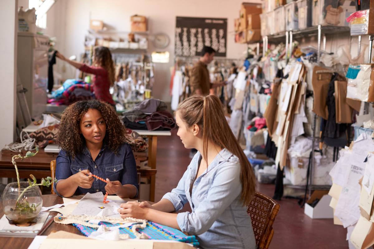 High school students in workroom with projects