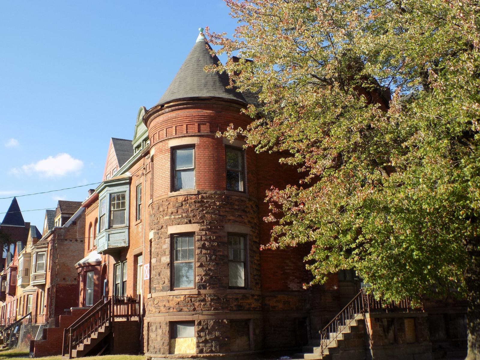 Brick building with a round turret 