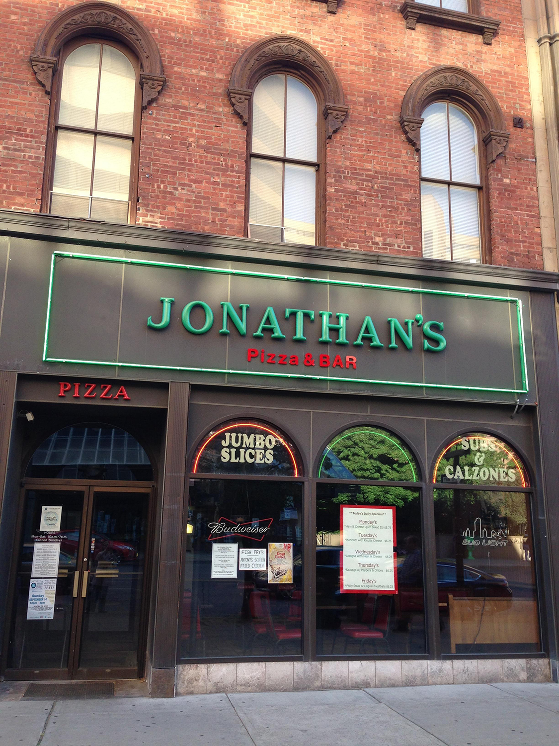 Jonathan’s Pizza sign on building front