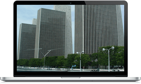 Laptop with NYS Agency buildings on screen