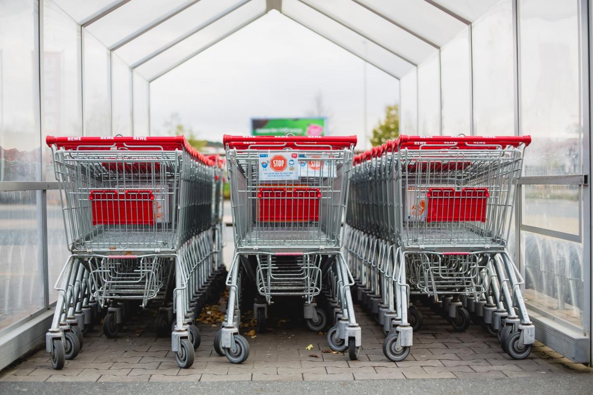 Shopping carts in parking lot corral