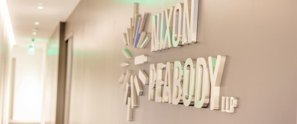 Nixon Peabody logo sign on wall