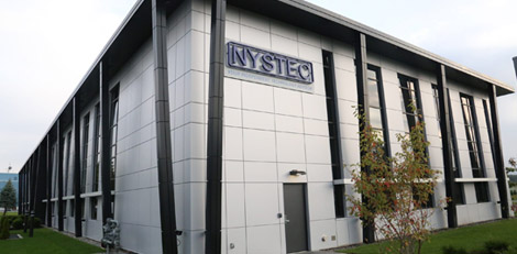 Building with NYSTEC sign