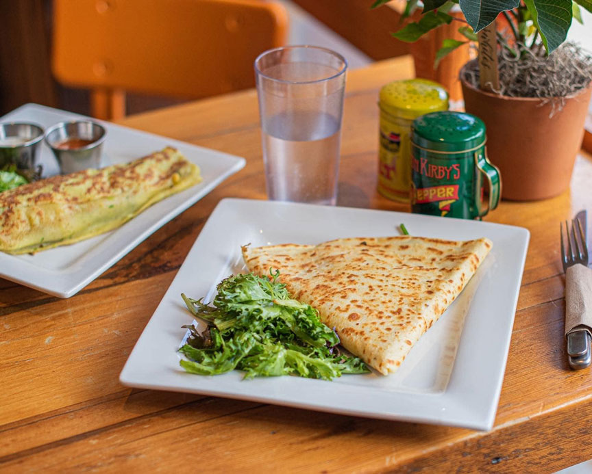 Plate with a crepe and side salad 