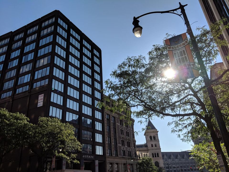 41 State Street image with sun shining through leaves