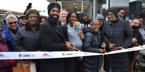 People stand in line at South End Grocery ribbon cutting