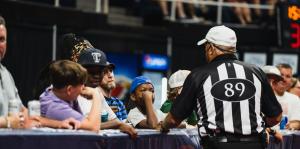 Referee looks at event attendees