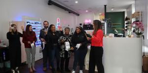 People celebrating the ribbon cutting at STUDIO23