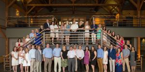 Staff on and in front of stairway