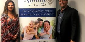 Staff with A New England Nanny banner