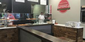 Pizza counter inside Pizzeria Sapienza