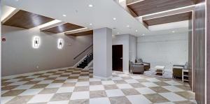 Tile floor hallway with meeting area