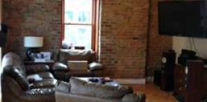 Photo of a residence's living space at The Lofts at 111 Pine.