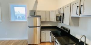 Kitchen in apartment shown