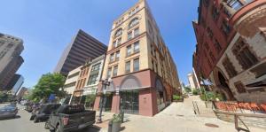 Exterior of 58 N Pearl with surrounding buildings
