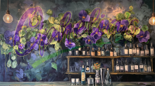 Painting of a bar with bottles on shelves and the word Ophelia's on wall