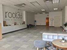 Interior open space with root3d logo on wall
