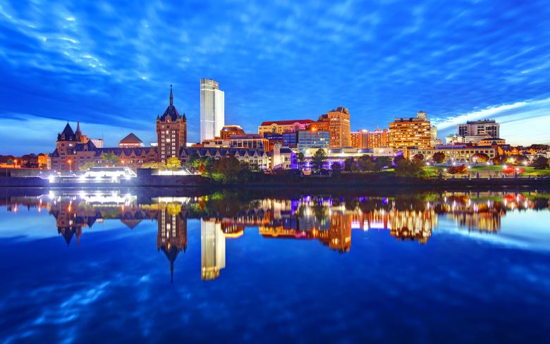 photo of Albany skyline with river in foreground