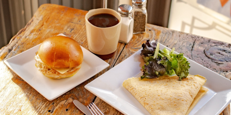 Egg sandwich, coffee, and crepe