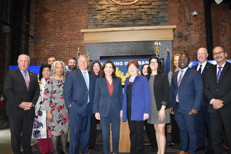 Image of Gov Kathy Hochul and Georgette Steffens along with other local and state leaders
