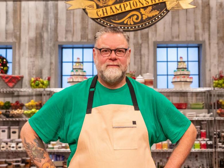 Dan Raymond wearing an Apron