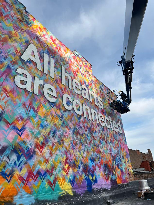 Mural saying All hearts are connected